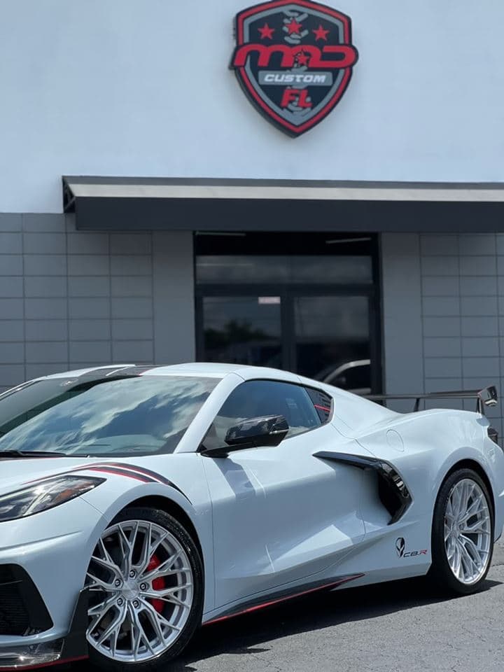 The MAD Custom Florida storefront with a Corvette C8.R Edition out front